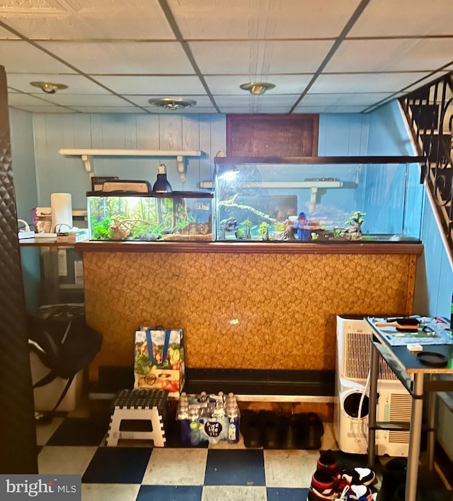 2817 Boyd St, Pennsauken, NJ 08110 - miscellaneous room with a drop ceiling and tile patterned floors