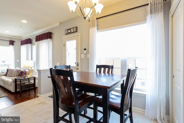 1712 Renaissance Dr, Baltimore, MD 21221 - dining room with a chandelier, ornamental molding, and recessed lighting