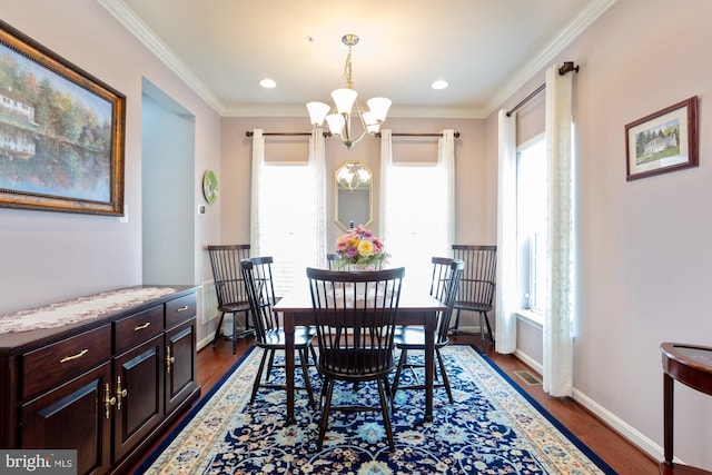 1712 Renaissance Dr, Baltimore, MD 21221 - dining room with a chandelier, plenty of natural light, wood finished floors, crown molding, and recessed lighting