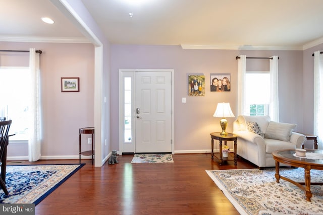 1712 Renaissance Dr, Baltimore, MD 21221 - foyer featuring crown molding, dark wood-type flooring, and recessed lighting