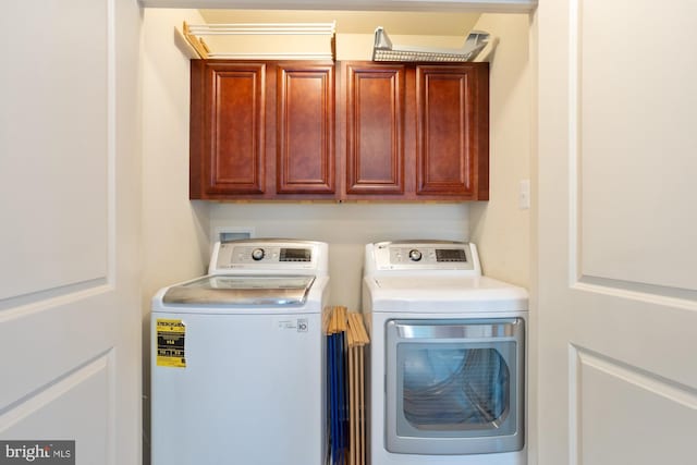 1712 Renaissance Dr, Baltimore, MD 21221 - washroom with washer and clothes dryer and cabinet space