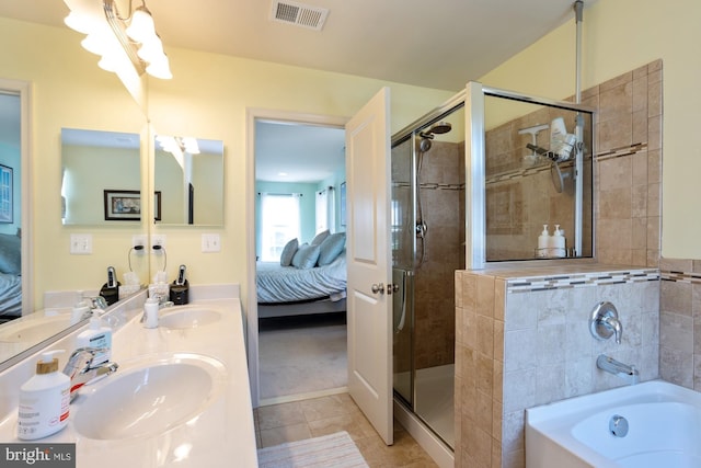 1712 Renaissance Dr, Baltimore, MD 21221 - full bath with ensuite bath, a bath, a stall shower, and tile patterned floors