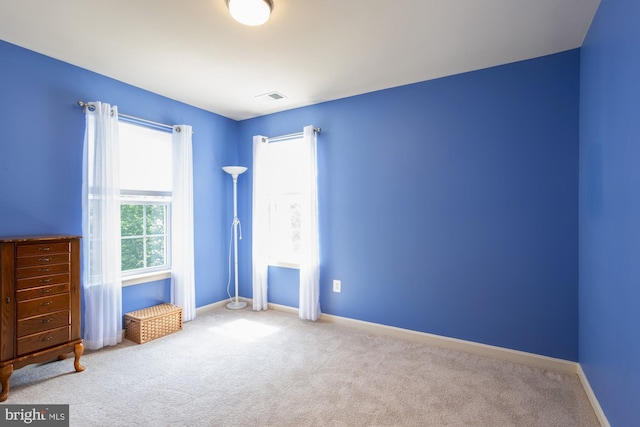 1712 Renaissance Dr, Baltimore, MD 21221 - carpeted spare room featuring baseboards