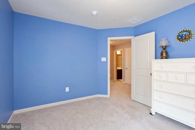 1712 Renaissance Dr, Baltimore, MD 21221 - unfurnished bedroom featuring light carpet and baseboards