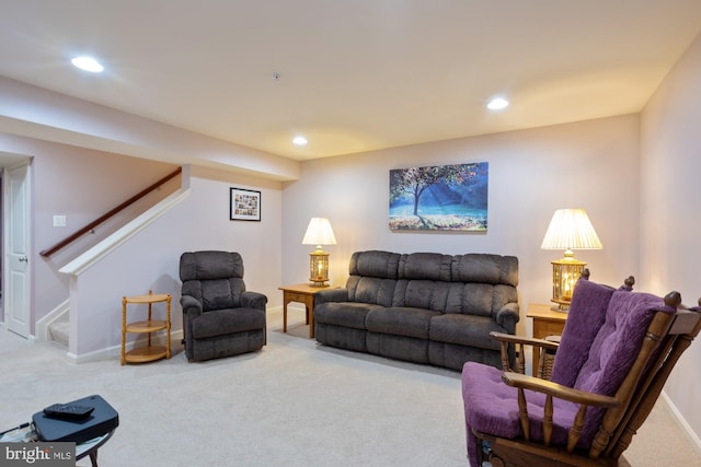 1712 Renaissance Dr, Baltimore, MD 21221 - carpeted living area with stairs and recessed lighting