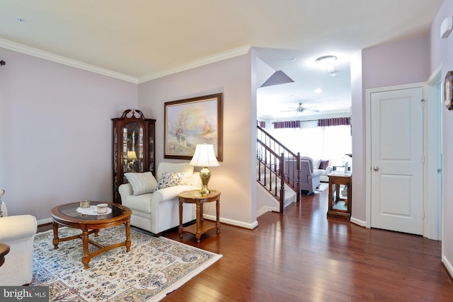 1712 Renaissance Dr, Baltimore, MD 21221 - living area with stairs, a ceiling fan, wood finished floors, and ornamental molding