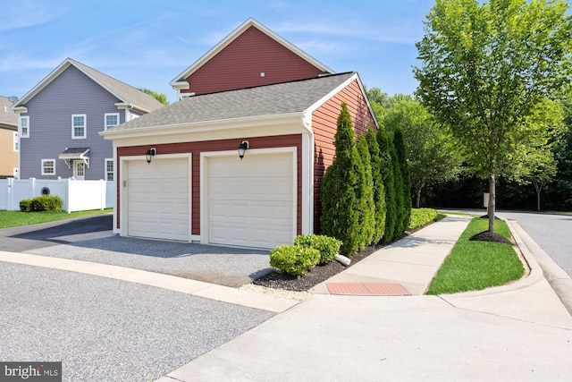 1712 Renaissance Dr, Baltimore, MD 21221 - garage featuring driveway