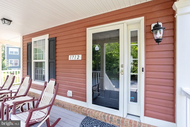 1712 Renaissance Dr, Baltimore, MD 21221 - doorway to property featuring covered porch