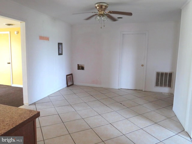 208 Cove St, Crisfield, MD 21817 - unfurnished room with a ceiling fan and light tile patterned floors