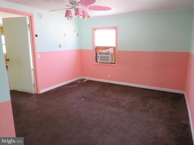208 Cove St, Crisfield, MD 21817 - spare room with a ceiling fan, healthy amount of natural light, cooling unit, carpet, and ornamental molding