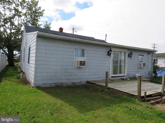 208 Cove St, Crisfield, MD 21817 - back of house featuring a deck, a chimney, and cooling unit