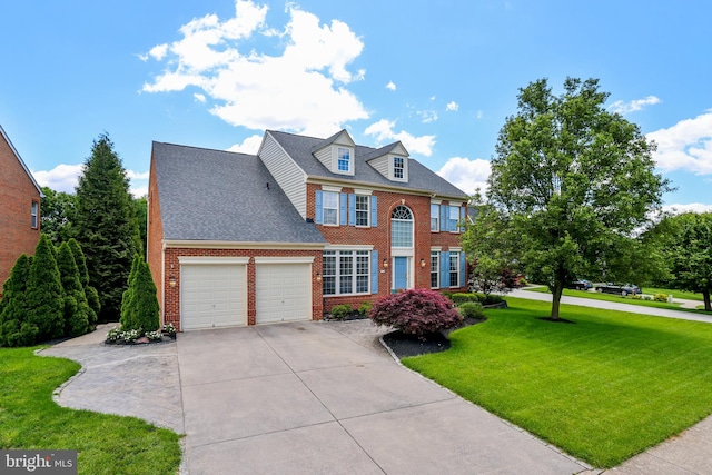 1504 Brookdale Ct, Winchester, VA 22601 - colonial inspired home featuring brick siding, concrete driveway, a front lawn, a garage, and a shingled roof
