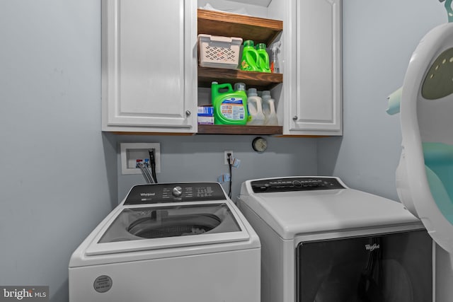 2610 Daniels Ln, Quakertown, PA 18951 - laundry room with independent washer and dryer and cabinet space