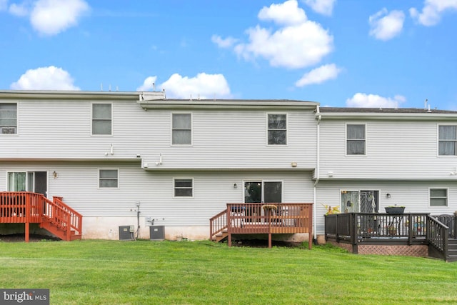 2610 Daniels Ln, Quakertown, PA 18951 - rear view of house with a wooden deck and a lawn