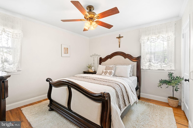 143 Moore Ave, Barrington, NJ 08007 - bedroom with wood finished floors, crown molding, and a ceiling fan