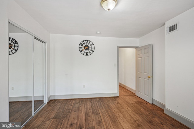 453 Hermitage St, Philadelphia, PA 19128 - unfurnished bedroom featuring wood finished floors and a closet