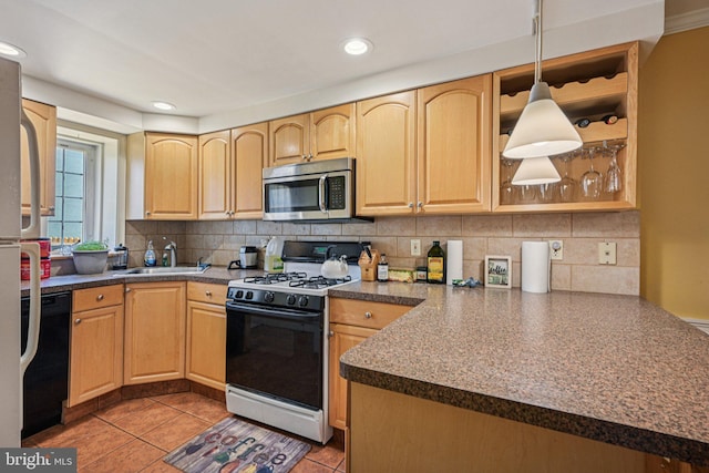453 Hermitage St, Philadelphia, PA 19128 - kitchen with black appliances, light tile patterned flooring, tasteful backsplash, decorative light fixtures, and dark countertops