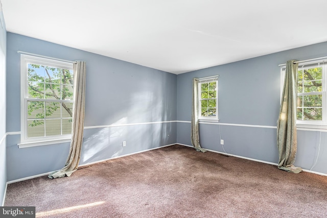 71 Winfield Rd, Sicklerville, NJ 08081 - carpeted empty room with baseboards