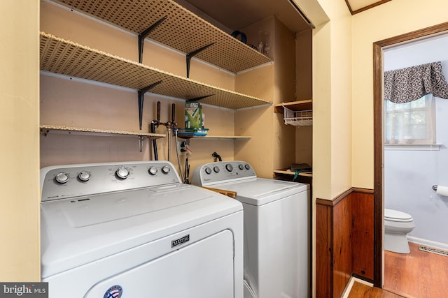71 Winfield Rd, Sicklerville, NJ 08081 - laundry area featuring wood finished floors, washer and dryer, and wainscoting