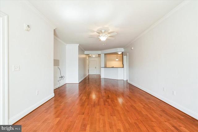 2700 Willow Oak Dr Unit 111B, Cambridge, MD 21613 - unfurnished living room with ceiling fan, light wood finished floors, and crown molding