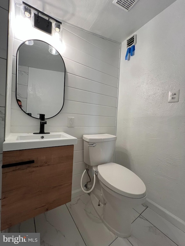 6309 61st Pl, Riverdale, MD 20737 - half bath with marble look tiles and vanity