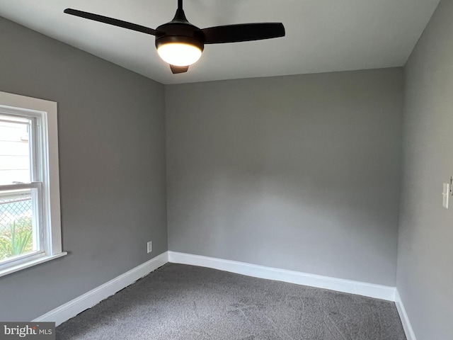 6309 61st Pl, Riverdale, MD 20737 - empty room featuring ceiling fan and dark colored carpet