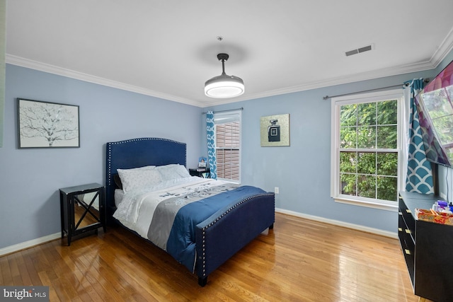 1712 Apple Blossom Ct, Bowie, MD 20721 - bedroom featuring crown molding and hardwood / wood-style flooring