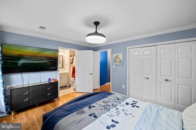 1712 Apple Blossom Ct, Bowie, MD 20721 - bedroom featuring ornamental molding, light wood finished floors, a closet, and connected bathroom