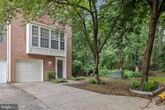 1712 Apple Blossom Ct, Bowie, MD 20721 - view of front of property featuring concrete driveway, brick siding, and an attached garage