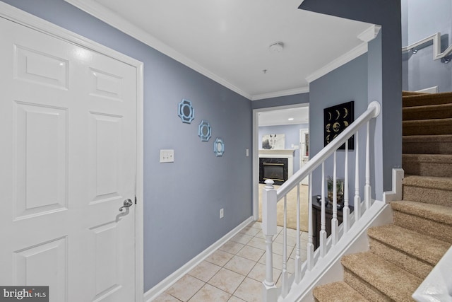 1712 Apple Blossom Ct, Bowie, MD 20721 - foyer entrance featuring light tile patterned flooring, stairs, crown molding, and a fireplace
