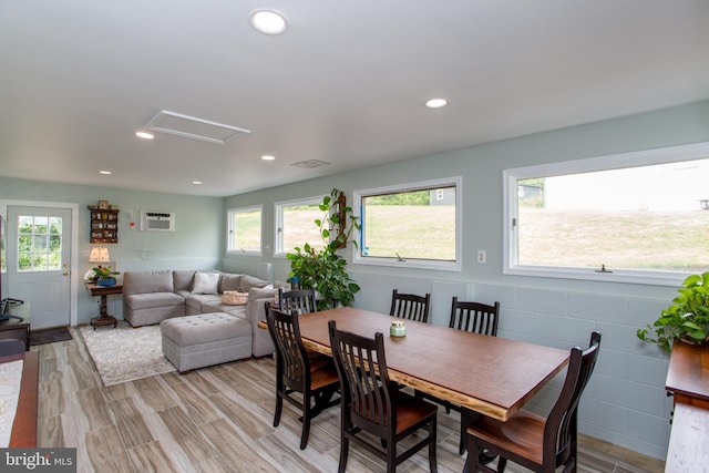 175 Pullen Station Rd, Quakertown, PA 18951 - dining space featuring a wall unit AC, recessed lighting, light wood-type flooring, and attic access