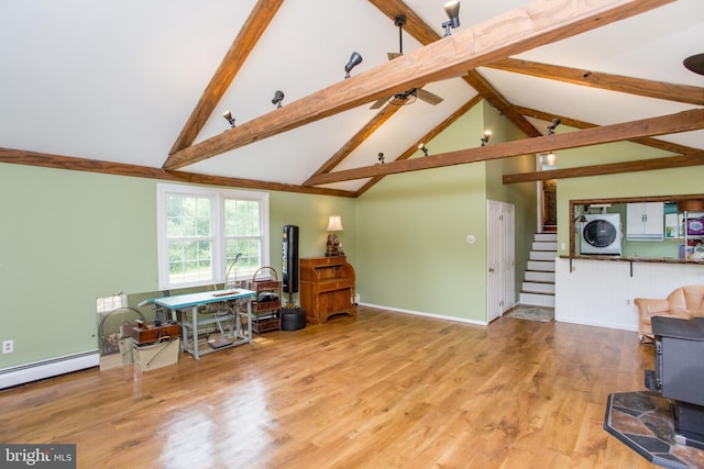 175 Pullen Station Rd, Quakertown, PA 18951 - living room with beamed ceiling, stairway, baseboard heating, wood finished floors, and a wood stove