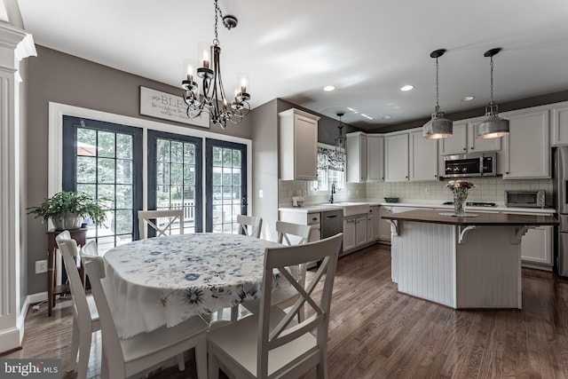 12655 Arthur Graves Jr Ct, Bristow, VA 20136 - dining room featuring a chandelier, dark wood-style floors, and recessed lighting