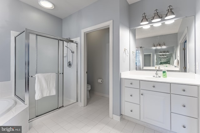12655 Arthur Graves Jr Ct, Bristow, VA 20136 - full bath featuring vanity, a shower stall, a garden tub, and tile patterned floors