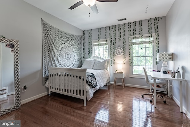 12655 Arthur Graves Jr Ct, Bristow, VA 20136 - bedroom with wood finished floors, a desk, and a ceiling fan