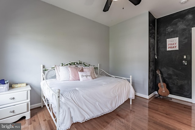 12655 Arthur Graves Jr Ct, Bristow, VA 20136 - bedroom with wood finished floors and a ceiling fan