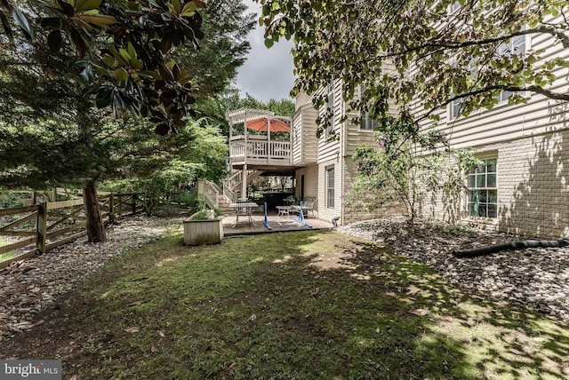 12655 Arthur Graves Jr Ct, Bristow, VA 20136 - view of yard with stairs, a wooden deck, and a patio area