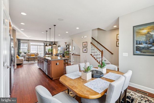 9924 Whitemoss Dr, Manassas, VA 20109 - dining area featuring recessed lighting, dark wood-style flooring, and stairs