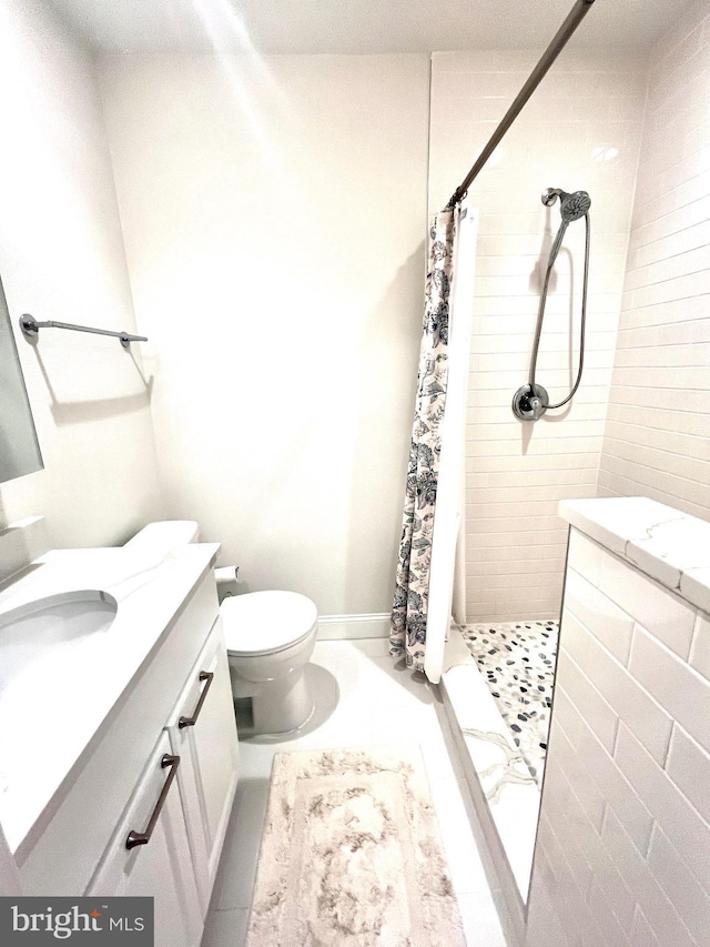 3601 5th St S Unit 408, Arlington, VA 22204 - bathroom with vanity and a tile shower