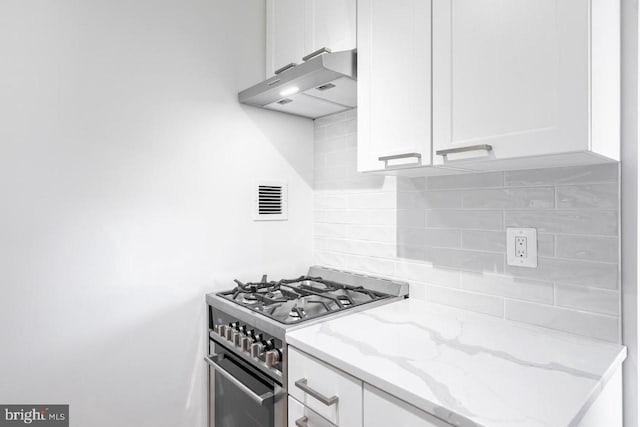 3601 5th St S Unit 408, Arlington, VA 22204 - kitchen featuring stainless steel stove, extractor fan, backsplash, and white cabinets
