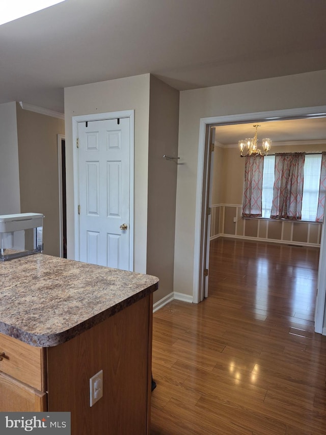 173 Ranson Estates Cir, Ranson, WV 25438 - kitchen featuring a chandelier and dark wood finished floors