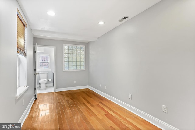 3016 Dillon St, Baltimore, MD 21224 - empty room featuring light wood-type flooring and recessed lighting