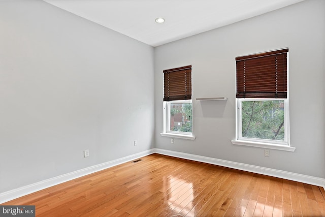 3016 Dillon St, Baltimore, MD 21224 - unfurnished room featuring wood-type flooring and recessed lighting