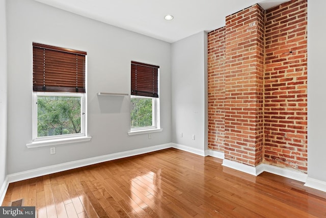 3016 Dillon St, Baltimore, MD 21224 - empty room with wood-type flooring and recessed lighting