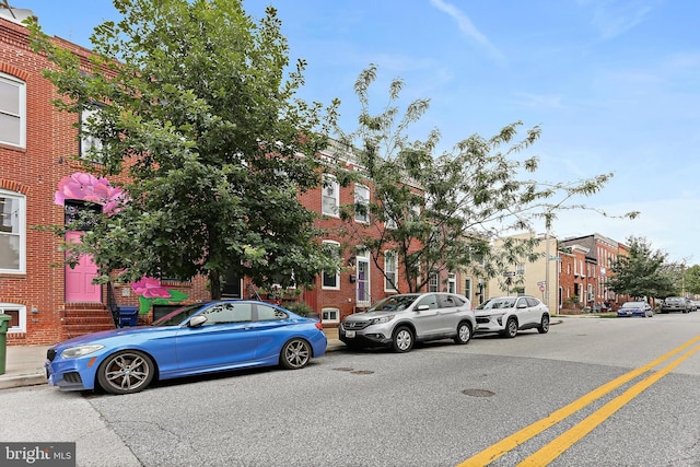 3016 Dillon St, Baltimore, MD 21224 - view of asphalt road featuring sidewalks