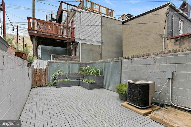 3016 Dillon St, Baltimore, MD 21224 - fenced backyard with a vegetable garden and a patio