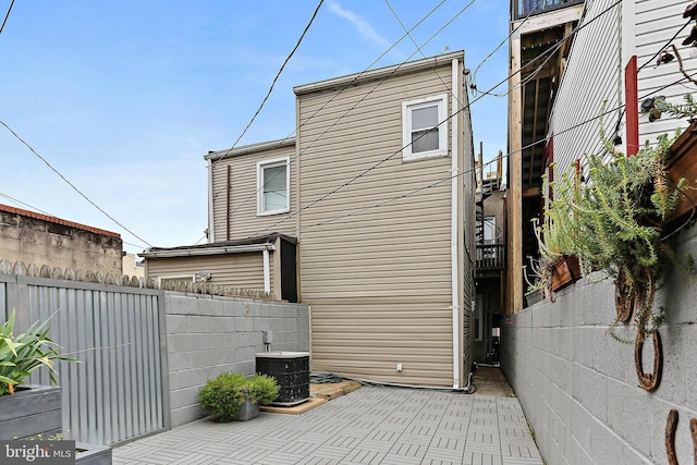 3016 Dillon St, Baltimore, MD 21224 - view of side of property with a patio area