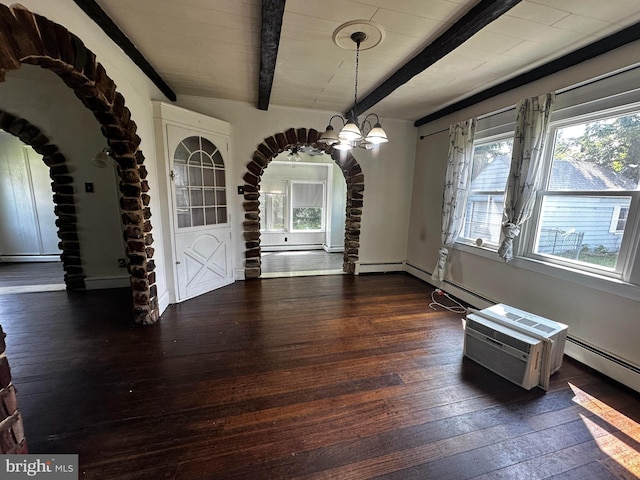 2326 Franklin Ave, Morton, PA 19070 - dining space with arched walkways, beamed ceiling, wood-type flooring, plenty of natural light, and a baseboard heating unit