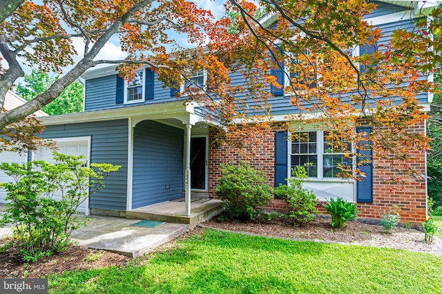 1240 Windmill Ln, Silver Spring, MD 20905 - view of front of home featuring a front yard and brick siding