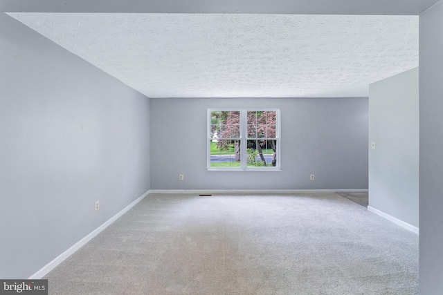 1240 Windmill Ln, Silver Spring, MD 20905 - spare room with carpet flooring and a textured ceiling
